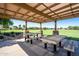 Covered outdoor grilling and picnic area, perfect for community gatherings and neighborhood barbecues at 4711 E Buckboard Ct, Gilbert, AZ 85297