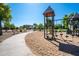 Fun playground area featuring play structures and a sand pit, perfect for active play and community engagement at 4711 E Buckboard Ct, Gilbert, AZ 85297