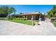 Community recreation center with covered walkways, landscaping, and convenient access at 4711 E Buckboard Ct, Gilbert, AZ 85297