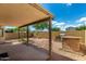 Backyard patio featuring a built in brick grill and planter boxes at 5320 E Silverbell Rd, San Tan Valley, AZ 85143