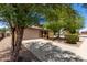 Charming home with a two-car garage and xeriscaped front yard for low-maintenance appeal at 5320 E Silverbell Rd, San Tan Valley, AZ 85143