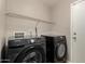 Laundry Room featuring new front load Samsung washer and dryer units at 5320 E Silverbell Rd, San Tan Valley, AZ 85143