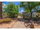 Stroll the peaceful greenbelt with mature trees and lush landscaping throughout community at 541 N Lesueur St, Mesa, AZ 85203
