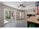 Work space office with a sliding glass door out to a covered patio at 541 N Lesueur St, Mesa, AZ 85203