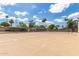 A fenced community tennis court, a great outdoor amenity for sports and recreation at 541 N Lesueur St, Mesa, AZ 85203