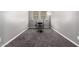 Exercise room featuring a carpeted floor, a weightlifting set, and bright light at 5519 N 187Th Ln, Litchfield Park, AZ 85340