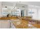 Bathroom features a vanity with granite countertop and a large mirror at 5742 W Shannon St, Chandler, AZ 85226