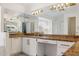 Bathroom with a large vanity, granite countertop, and ample lighting at 5742 W Shannon St, Chandler, AZ 85226