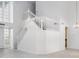 Bright foyer featuring a striking white staircase and large windows at 5742 W Shannon St, Chandler, AZ 85226