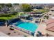 Aerial view of community pool, playground, and green spaces, perfect for outdoor enjoyment and recreation at 5840 E Holmes Ave, Mesa, AZ 85206