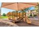 Community playground featuring slides and climbing structures, perfect for Gathering fun at 5840 E Holmes Ave, Mesa, AZ 85206