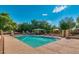 Community swimming pool with lounge seating and lush landscaping, ideal for relaxing and socializing at 5840 E Holmes Ave, Mesa, AZ 85206