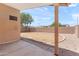 Backyard view, covered patio and rock landscaping, great space for outdoor activities and relaxation at 684 E Redondo Dr, Gilbert, AZ 85296