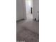 View of a bedroom featuring carpet floors and neutral walls at 7325 W Wilshire Dr, Phoenix, AZ 85035