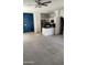 Open kitchen featuring stainless steel appliances and black countertops at 7325 W Wilshire Dr, Phoenix, AZ 85035