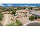Aerial shot showcasing the three-car garage and landscaped frontage at 7432 W Bronco Trl, Peoria, AZ 85383