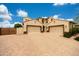 Spacious two-story home featuring a paved circular driveway and a three-car garage at 7432 W Bronco Trl, Peoria, AZ 85383