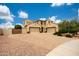 Spacious two-story home featuring a paved circular driveway and a three-car garage at 7432 W Bronco Trl, Peoria, AZ 85383
