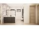 Stylish bathroom with a marble accent wall, double vanity, and sleek black fixtures at 7445 E Vista Dr, Scottsdale, AZ 85250