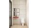 Sleek powder room featuring a modern sink, floating shelf, square mirrors, and contrasting fixtures at 7445 E Vista Dr, Scottsdale, AZ 85250