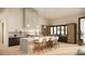 Contemporary kitchen with an expansive island, stainless steel appliances, and sleek cabinetry at 7445 E Vista Dr, Scottsdale, AZ 85250