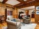 Comfortable living area with hardwood floors, plush chairs, and a view into the bedroom at 8022 N Ironwood Dr, Paradise Valley, AZ 85253