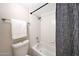 Clean bathroom featuring a shower-tub combo with tiled walls and updated fixtures at 850 S River Dr # 1047, Tempe, AZ 85281