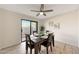 Charming dining area with a sliding glass door and modern accents offering a bright space at 850 S River Dr # 1047, Tempe, AZ 85281