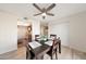 Dining area with a view to the kitchen and storage closets at 850 S River Dr # 1047, Tempe, AZ 85281