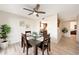 Dining area featuring stylish decor, and a ceiling fan adding a touch of modern elegance at 850 S River Dr # 1047, Tempe, AZ 85281