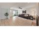 Bright living room with an open floor plan and a sliding glass door to the patio at 850 S River Dr # 1047, Tempe, AZ 85281