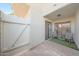 Exterior patio space with seating, artificial turf, and a privacy fence at 850 S River Dr # 1047, Tempe, AZ 85281