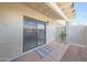 View of the outdoor patio with sliding glass door, showing indoor dining at 850 S River Dr # 1047, Tempe, AZ 85281