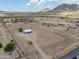 Spacious desert property with a house, clearly marked boundaries, and mountain views at 11192 N Johnson Rd, Maricopa, AZ 85139