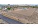 Expansive lot with single story home, surrounded by desert landscape and mountain views at 11192 N Johnson Rd, Maricopa, AZ 85139