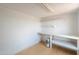 Basement with work bench and storage, ready for customization and projects at 11192 N Johnson Rd, Maricopa, AZ 85139