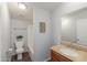 Cozy bathroom with granite countertop vanity, framed mirror, and tub-shower combo at 11192 N Johnson Rd, Maricopa, AZ 85139