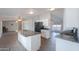 Well-designed kitchen with gray countertops, stainless appliances, and an open-concept layout at 11192 N Johnson Rd, Maricopa, AZ 85139
