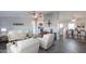 Inviting living room with modern flooring, neutral paint, and an open layout at 11192 N Johnson Rd, Maricopa, AZ 85139