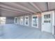 Spacious covered patio with carpet, recessed lighting and mountain views at 11192 N Johnson Rd, Maricopa, AZ 85139
