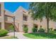 Condo complex with covered stairway, and inviting landscaping at 11333 N 92Nd St # 1075, Scottsdale, AZ 85260