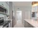 Bright kitchen with stainless steel appliances and island featuring dishwasher at 11333 N 92Nd St # 1075, Scottsdale, AZ 85260