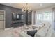 Bright living room featuring a modern fireplace, TV, and sliding glass doors at 11333 N 92Nd St # 1075, Scottsdale, AZ 85260