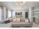 Bright living room featuring modern lighting, open floor plan, and neutral decor at 11333 N 92Nd St # 1075, Scottsdale, AZ 85260