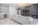 Living room with built-in bar area, modern fireplace, and comfortable seating at 11333 N 92Nd St # 1075, Scottsdale, AZ 85260