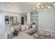 Open-concept living space with a modern sofa, stylish lighting, and dining area at 11333 N 92Nd St # 1075, Scottsdale, AZ 85260