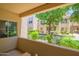 Cozy patio area overlooks lush greenery and community landscaping at 11333 N 92Nd St # 1075, Scottsdale, AZ 85260