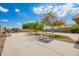 Large backyard with a picnic table and desert landscaping, perfect for enjoying the outdoors at 1145 E Harold Dr, San Tan Valley, AZ 85140