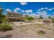 Expansive backyard with a basketball court, mature trees, and potential for landscaping customization at 1145 E Harold Dr, San Tan Valley, AZ 85140