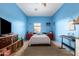 Spacious bedroom with neutral walls, ceiling fan, and plenty of sunlight at 1145 E Harold Dr, San Tan Valley, AZ 85140